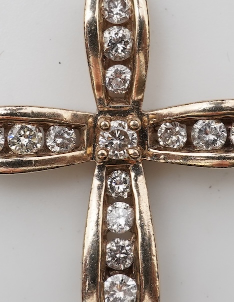 A diamond cross pendant